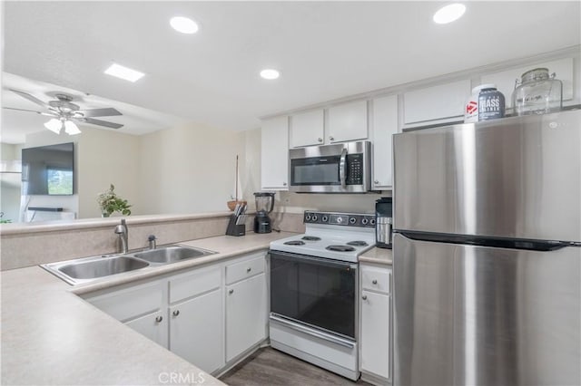 3623 Legato Ct, Pomona, CA 91766 - kitchen featuring appliances with stainless steel finishes, light countertops, white cabinetry, recessed lighting, and a ceiling fan