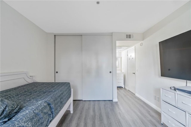 3623 Legato Ct, Pomona, CA 91766 - bedroom with light wood-style flooring and a closet