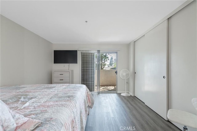 3623 Legato Ct, Pomona, CA 91766 - bedroom with wood finished floors, access to outside, and a closet