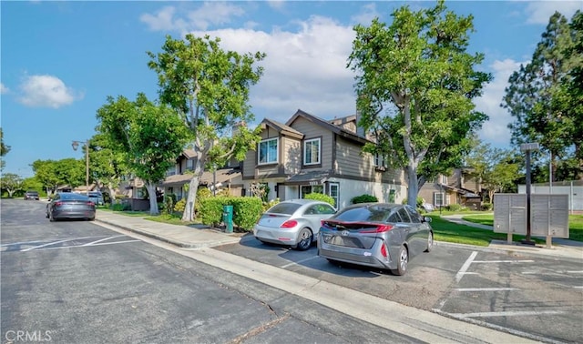 2323 S Cutty Way Unit 58, Anaheim, CA 92802 - townhome / multi-family property featuring a residential view and uncovered parking