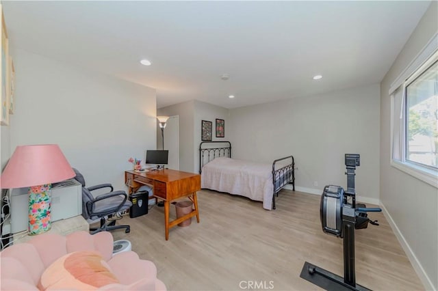 2323 S Cutty Way Unit 58, Anaheim, CA 92802 - bedroom with light wood-style flooring, recessed lighting, and a desk