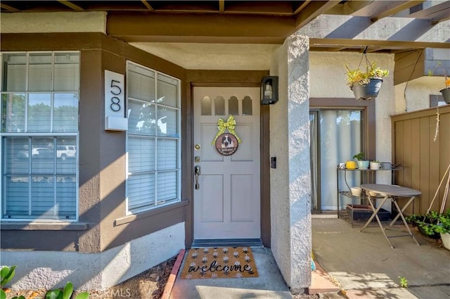2323 S Cutty Way Unit 58, Anaheim, CA 92802 - entrance to property with stucco siding and a porch