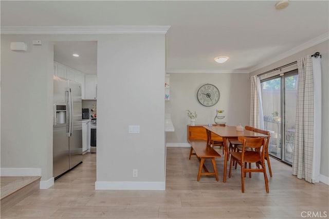 2323 S Cutty Way Unit 58, Anaheim, CA 92802 - dining area with ornamental molding and light wood-type flooring
