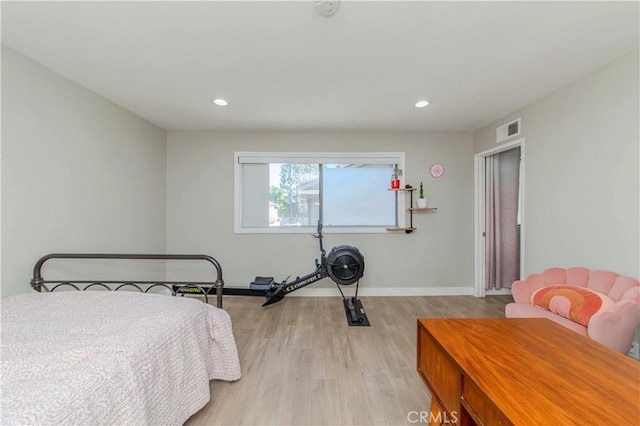 2323 S Cutty Way Unit 58, Anaheim, CA 92802 - bedroom with light wood-type flooring and recessed lighting