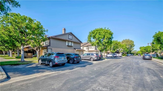 2323 S Cutty Way Unit 58, Anaheim, CA 92802 - view of asphalt street with curbs and sidewalks