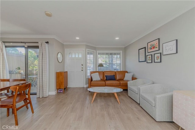 2323 S Cutty Way Unit 58, Anaheim, CA 92802 - living area with light wood finished floors, recessed lighting, and ornamental molding