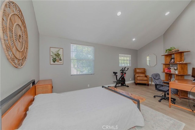 2323 S Cutty Way Unit 58, Anaheim, CA 92802 - bedroom with wood finished floors, vaulted ceiling, recessed lighting, and an office area