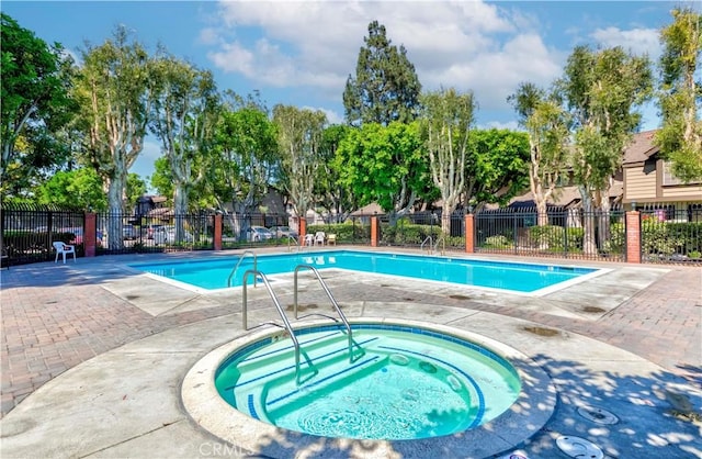 2323 S Cutty Way Unit 58, Anaheim, CA 92802 - community pool with a community hot tub and a patio area