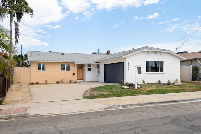 4936 Mount Elbrus Dr, San Diego, CA 92117 - single story home with driveway, an attached garage, and stucco siding