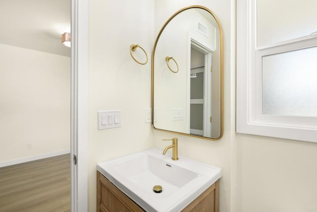 4936 Mount Elbrus Dr, San Diego, CA 92117 - bathroom featuring vanity and wood finished floors