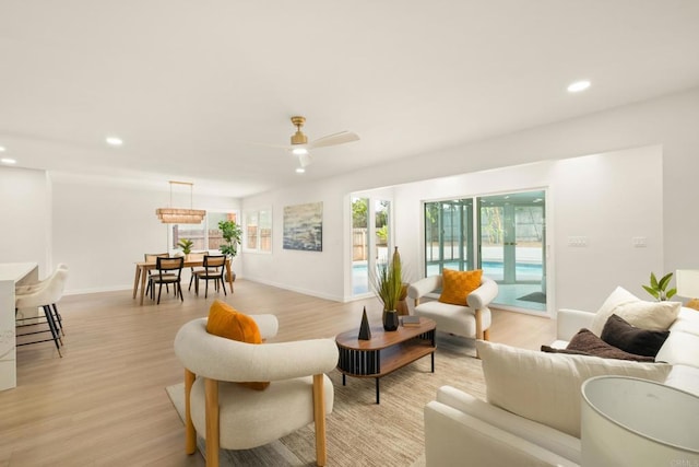 4936 Mount Elbrus Dr, San Diego, CA 92117 - living area with light wood-style floors, recessed lighting, and a ceiling fan