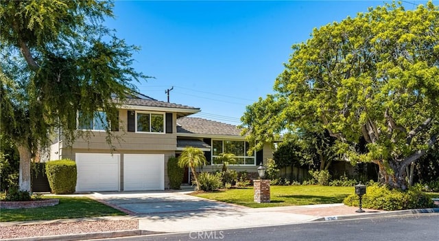17542 Rainier Dr, North Tustin, CA 92705 - split level home featuring driveway, a front yard, and a garage