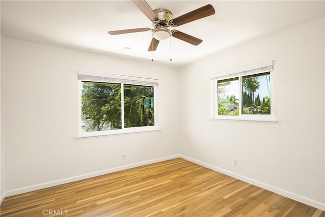 17542 Rainier Dr, North Tustin, CA 92705 - unfurnished room with baseboards and light wood finished floors