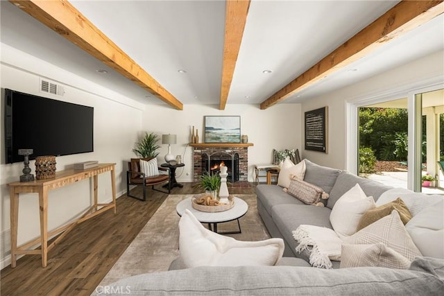 17542 Rainier Dr, North Tustin, CA 92705 - living room featuring beam ceiling, wood finished floors, a brick fireplace, and recessed lighting