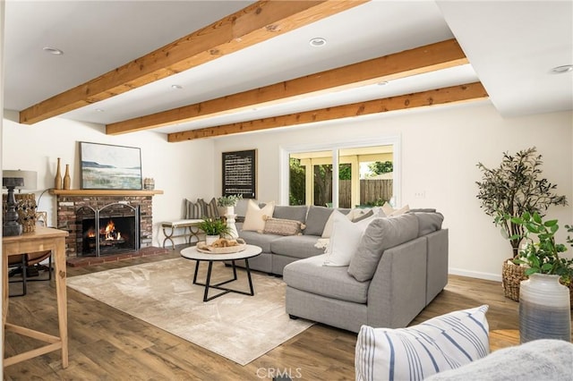 17542 Rainier Dr, North Tustin, CA 92705 - living room with beam ceiling, a fireplace, wood finished floors, and recessed lighting