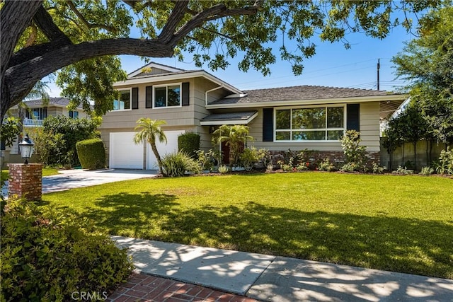 17542 Rainier Dr, North Tustin, CA 92705 - view of front facade featuring concrete driveway, a front yard, and a garage