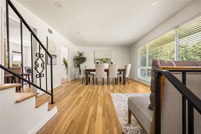 17542 Rainier Dr, North Tustin, CA 92705 - dining room with stairs, light wood-type flooring, and recessed lighting