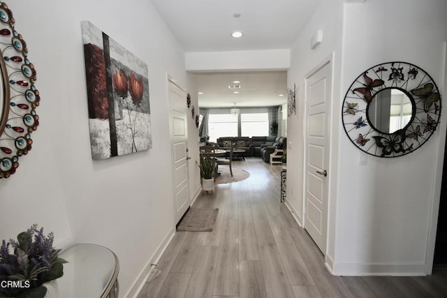 1622 Trailview Dr, Beaumont, CA 92223 - hallway featuring light wood-type flooring and recessed lighting