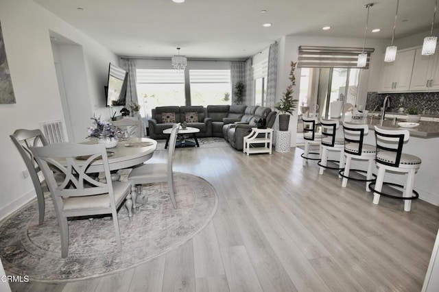 1622 Trailview Dr, Beaumont, CA 92223 - dining space with light wood-style flooring and recessed lighting