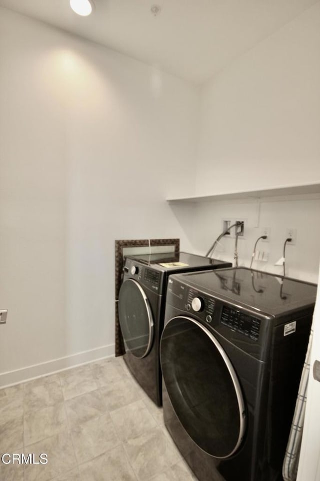 1622 Trailview Dr, Beaumont, CA 92223 - washroom featuring washing machine and dryer and baseboards