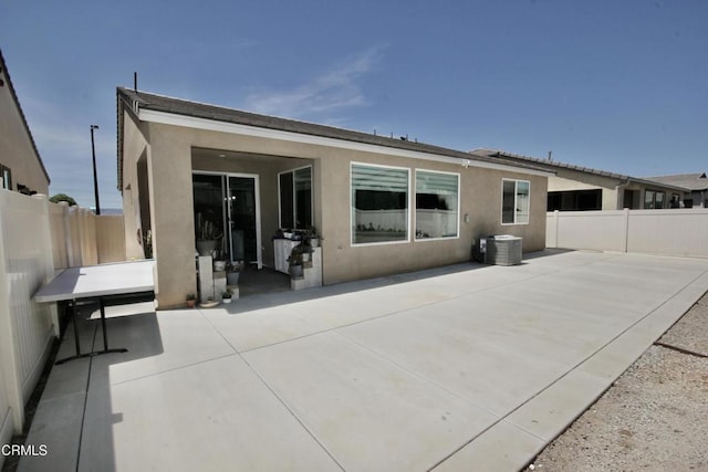 1622 Trailview Dr, Beaumont, CA 92223 - back of property featuring a patio area and stucco siding