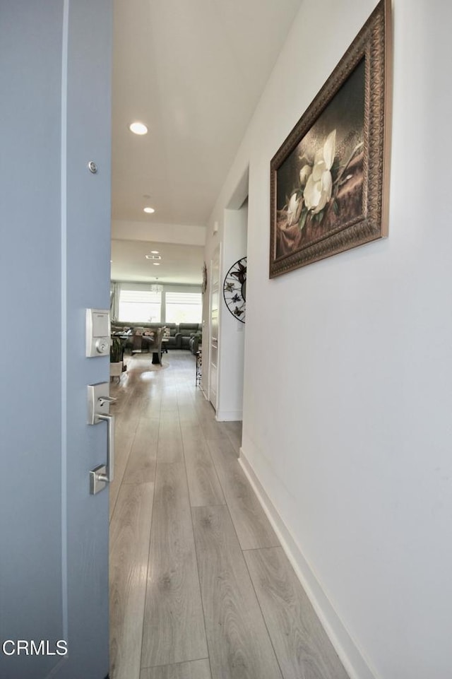 1622 Trailview Dr, Beaumont, CA 92223 - hallway featuring light wood-style flooring and recessed lighting