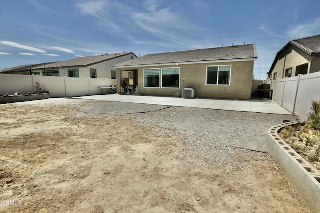 1622 Trailview Dr, Beaumont, CA 92223 - back of property with a patio, stucco siding, and a fenced backyard