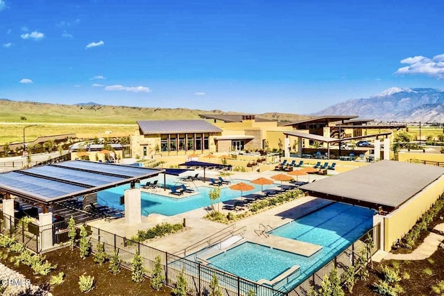 1622 Trailview Dr, Beaumont, CA 92223 - community pool featuring a mountain view and a patio area