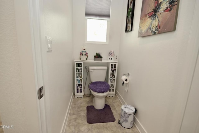 1622 Trailview Dr, Beaumont, CA 92223 - half bathroom featuring toilet and baseboards