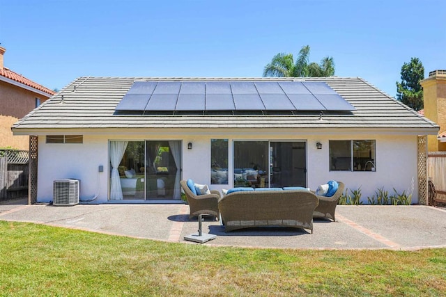 5452 Gooseberry Way, Oceanside, CA 92057 - back of house featuring a patio area, stucco siding, roof mounted solar panels, and a chimney