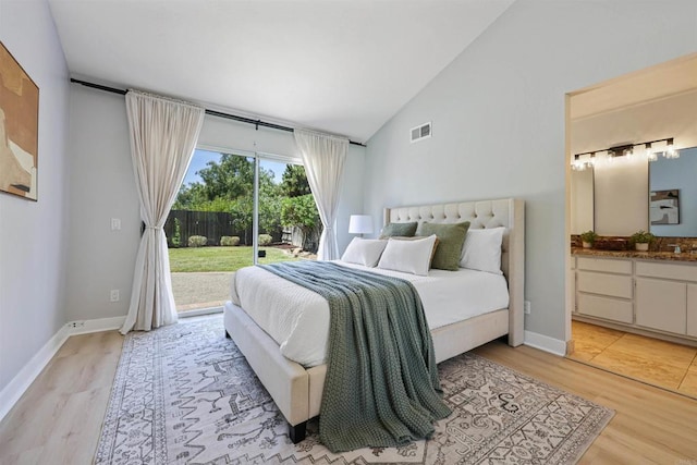 5452 Gooseberry Way, Oceanside, CA 92057 - bedroom featuring access to outside, vaulted ceiling, light wood-style flooring, and connected bathroom
