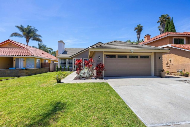 5452 Gooseberry Way, Oceanside, CA 92057 - view of front of home featuring an attached garage, concrete driveway, and a chimney