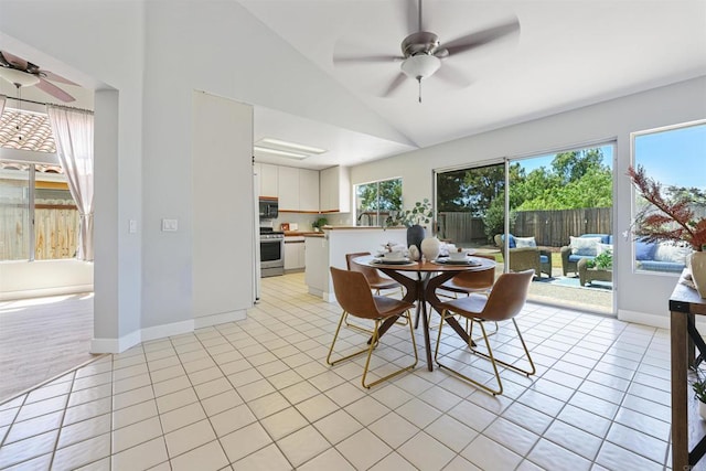 5452 Gooseberry Way, Oceanside, CA 92057 - dining room with lofted ceiling, ceiling fan, and light tile patterned floors