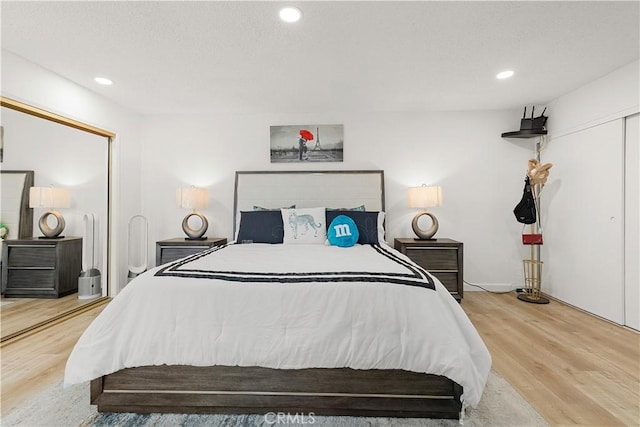 6002 Calvin Cir, Huntington Beach, CA 92647 - bedroom featuring wood finished floors and recessed lighting