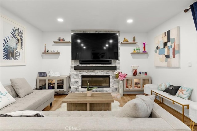 6002 Calvin Cir, Huntington Beach, CA 92647 - living area featuring wood finished floors, a premium fireplace, and recessed lighting