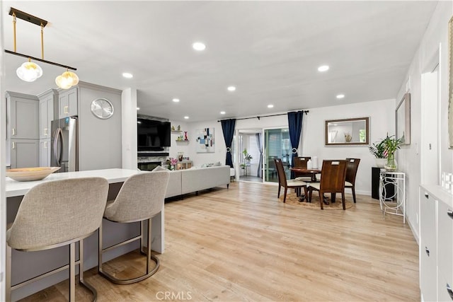 6002 Calvin Cir, Huntington Beach, CA 92647 - dining space featuring light wood finished floors and recessed lighting