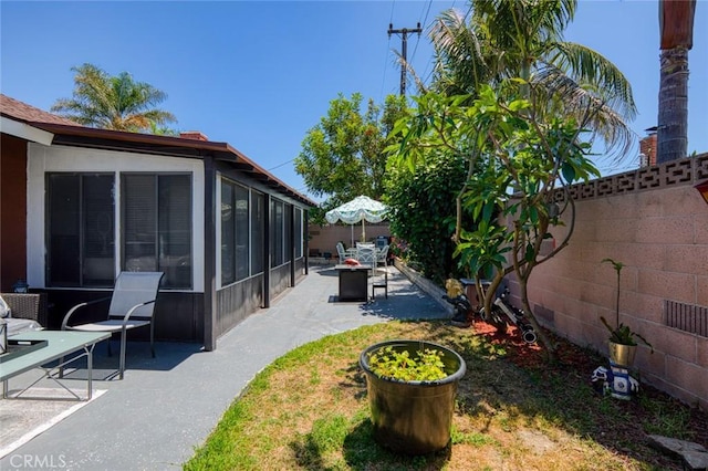 6002 Calvin Cir, Huntington Beach, CA 92647 - fenced backyard with a sunroom and a patio