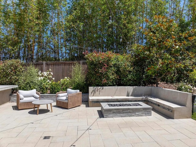 744 Adelaide Cir, Encinitas, CA 92024 - fenced backyard with a patio and an outdoor living space with a fire pit