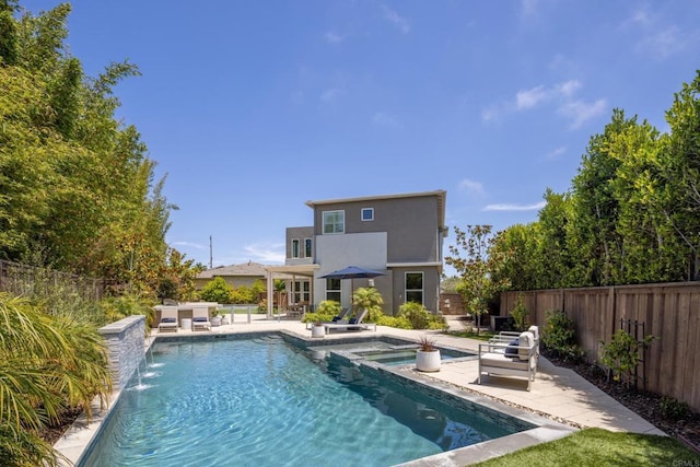 744 Adelaide Cir, Encinitas, CA 92024 - view of swimming pool with a patio area, a fenced backyard, and a pool with connected hot tub
