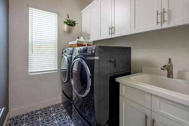 744 Adelaide Cir, Encinitas, CA 92024 - laundry room featuring independent washer and dryer and cabinet space