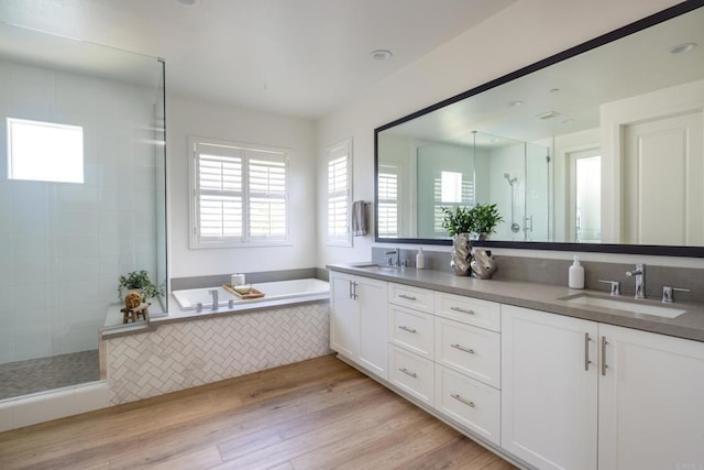 744 Adelaide Cir, Encinitas, CA 92024 - full bath featuring double vanity, a bath, wood finished floors, and tiled shower