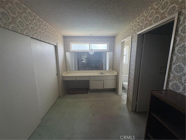 197 Limestone Rd, Claremont, CA 91711 - bathroom with wallpapered walls, a textured ceiling, and vanity