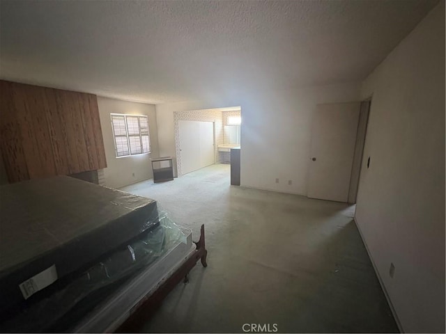 197 Limestone Rd, Claremont, CA 91711 - carpeted living room with a textured ceiling