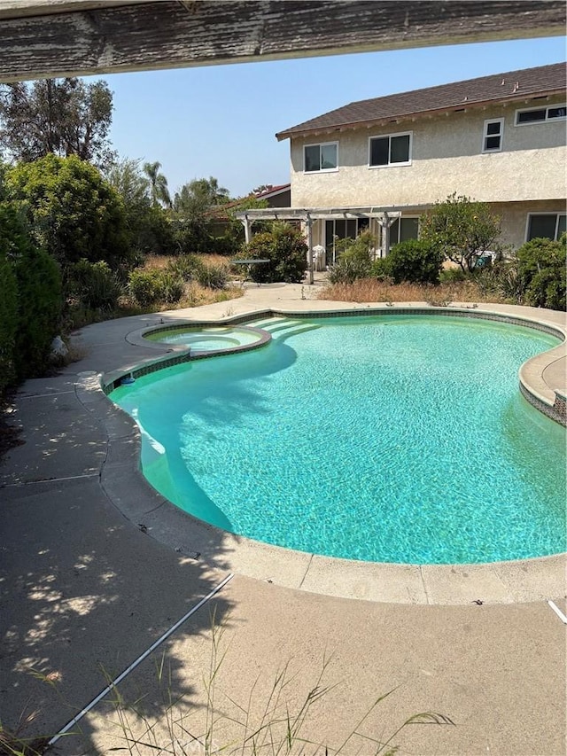 197 Limestone Rd, Claremont, CA 91711 - view of swimming pool with a pool with connected hot tub and a patio area