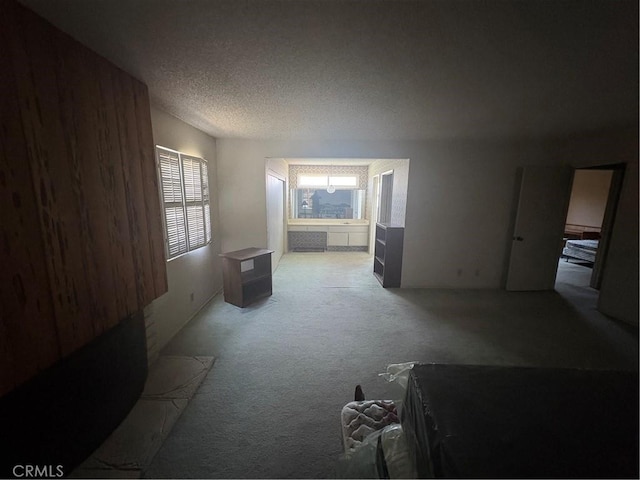 197 Limestone Rd, Claremont, CA 91711 - living room featuring carpet flooring and a textured ceiling