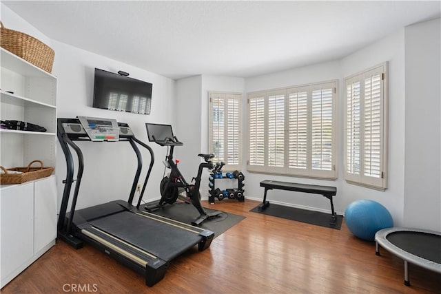 8042 Masefield Ct, West Hills, CA 91304 - exercise room with healthy amount of natural light and wood finished floors
