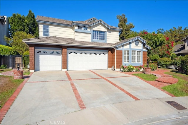 8042 Masefield Ct, West Hills, CA 91304 - traditional-style house featuring driveway, an attached garage, and a tiled roof
