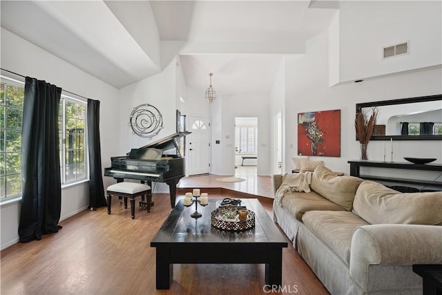 8042 Masefield Ct, West Hills, CA 91304 - living room with wood finished floors and high vaulted ceiling