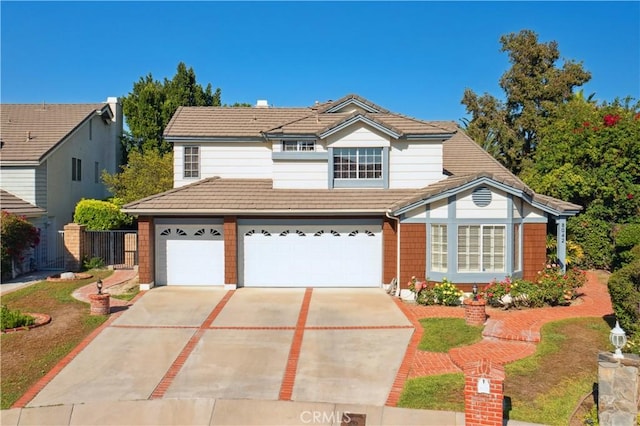 8042 Masefield Ct, West Hills, CA 91304 - traditional home featuring driveway, a tiled roof, and an attached garage