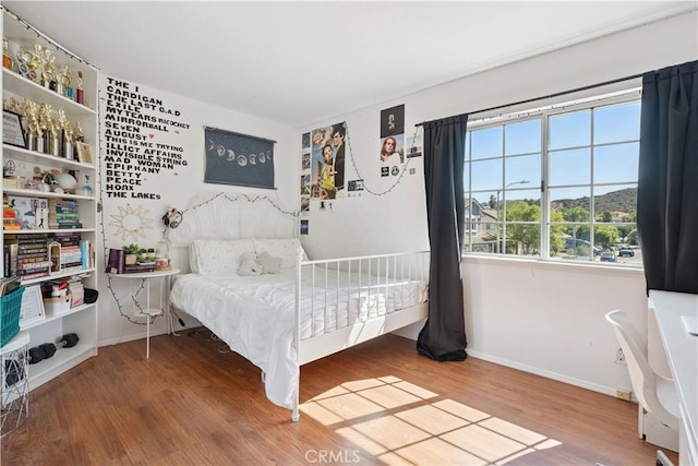 8042 Masefield Ct, West Hills, CA 91304 - bedroom with wood finished floors and baseboards